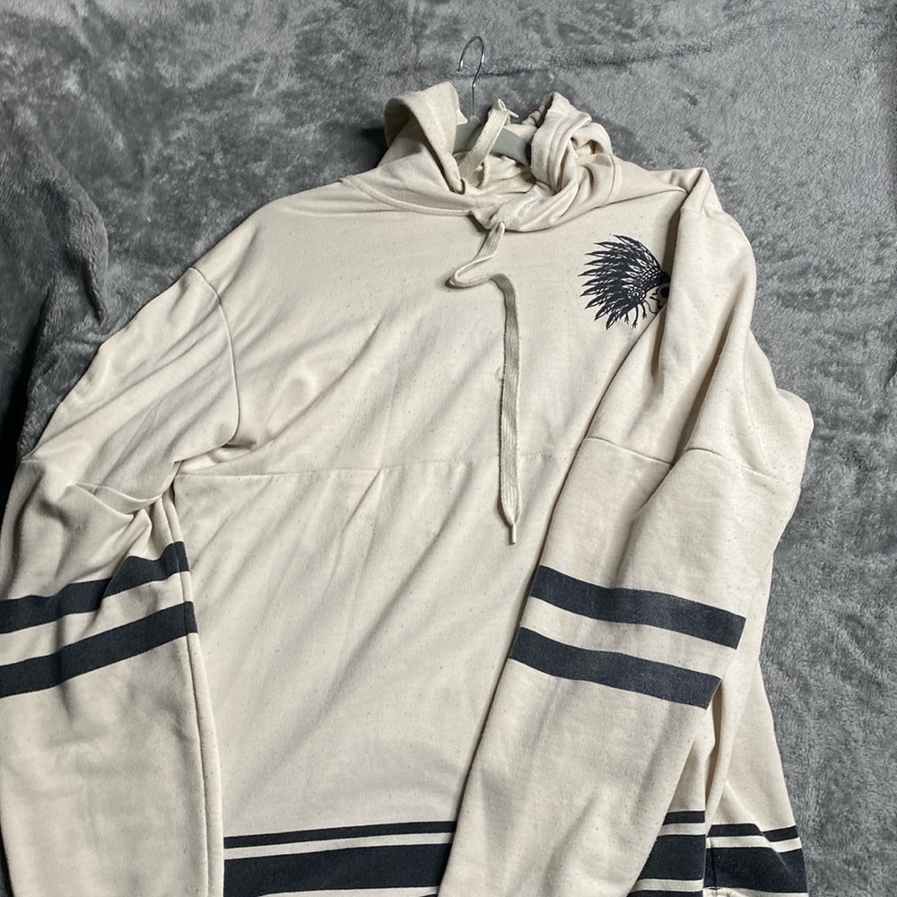 A cream elongated hoodie